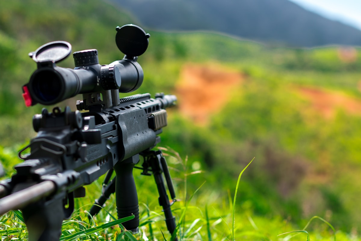 A rifle resting on a surface